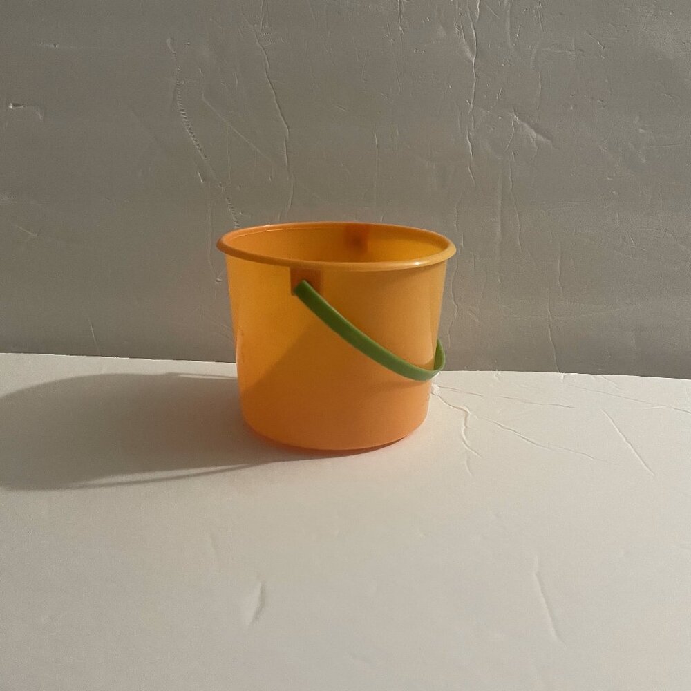 Small Orange Pail with Green Handle